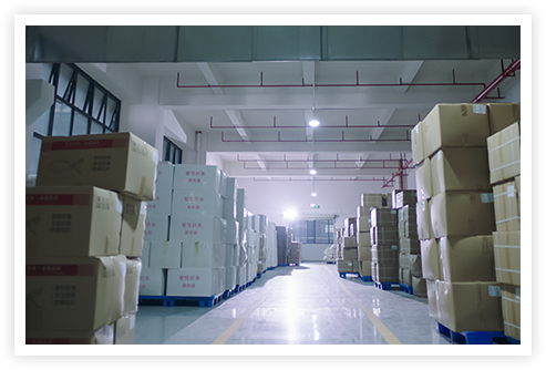 Warehouse with stacked containers